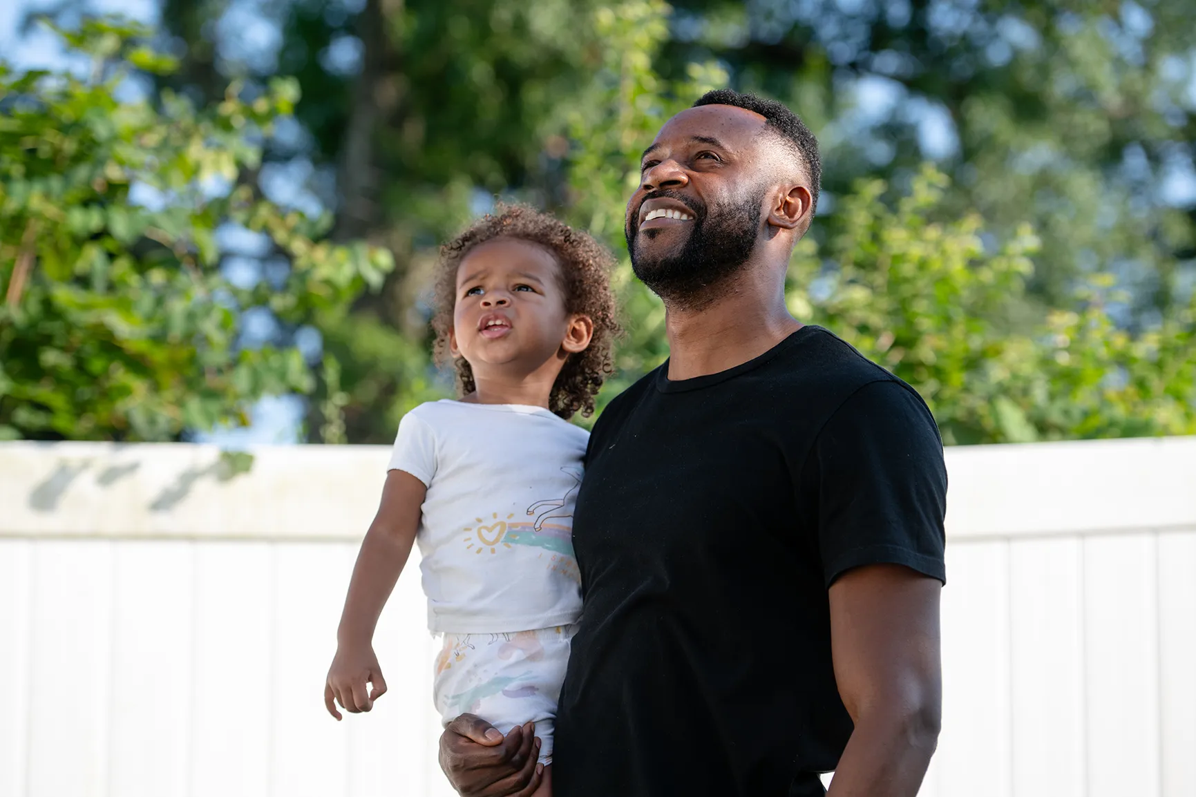 Jon and Jade watching a jet fly overhead